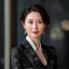 豪门国际客户李女士，优雅知性的女性企业家，精致妆容与商务着装展现高净值精英气质